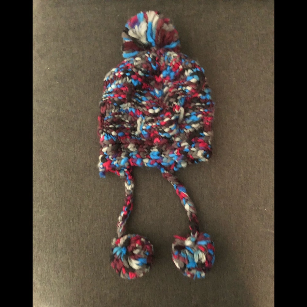 Multi-colored Knitted Beanie with hanging Pom Poms